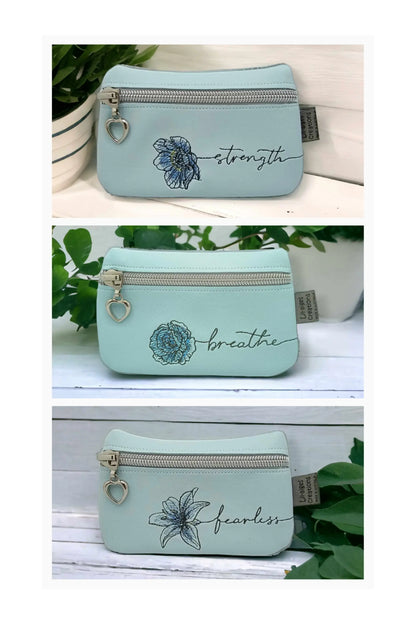 Strength in Style: Light Blue Zipper Coin Purse with Poppy Design - Image #2