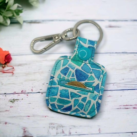 Blue mosaic themed vinyl supermarket trolley coin holder keychain with lobster clip and ring included.  This useful gift can be used over and over again and saves you time looking for you $1 or Aldi token.